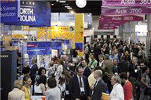 Image: Conference attendees making their way through the BIO exhibit hall (Photo courtesy of Biotechnology Industry Organization).